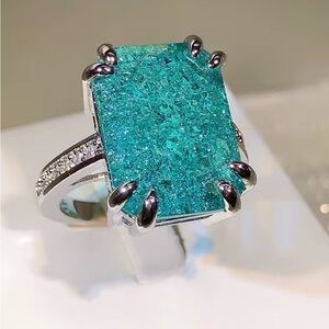 Stunning Silver Ring with Teal Centerpiece